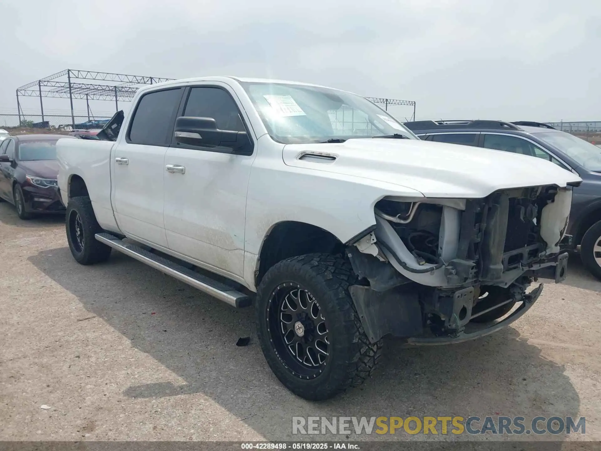 1 Photograph of a damaged car 1C6SRFMT9KN644227 RAM 1500 2019