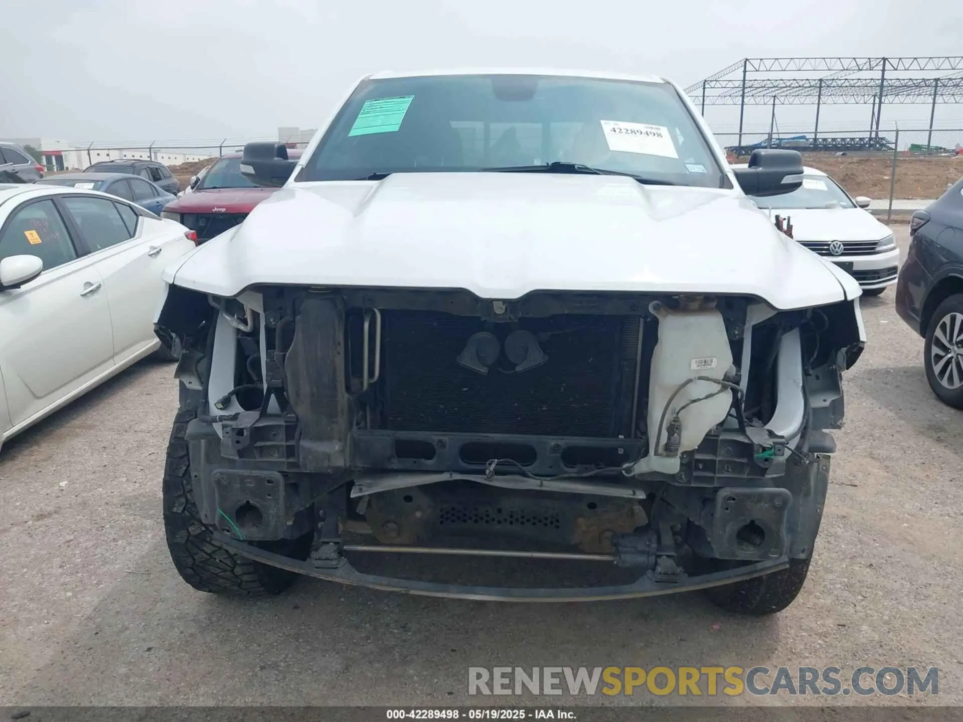12 Photograph of a damaged car 1C6SRFMT9KN644227 RAM 1500 2019