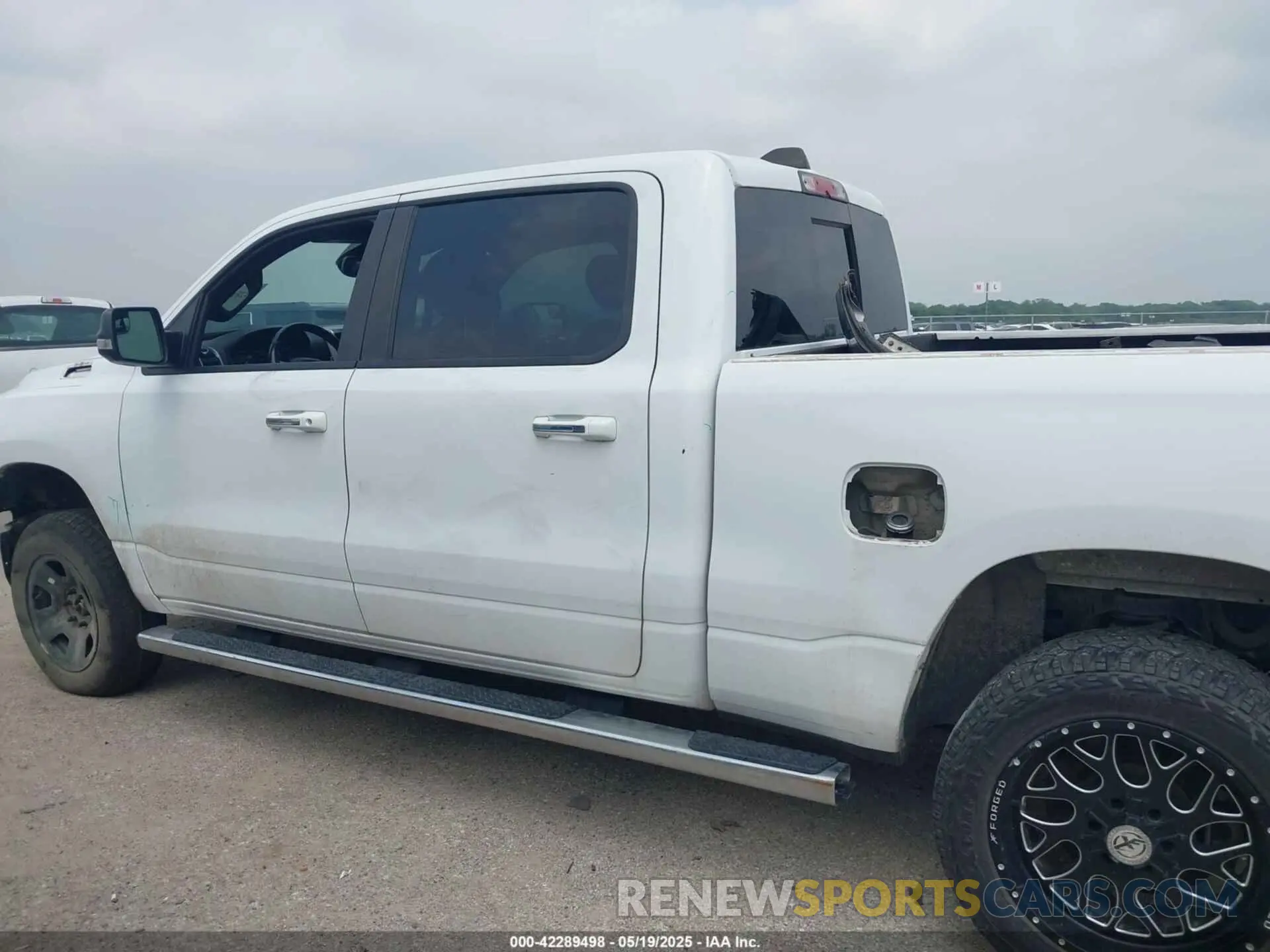 14 Photograph of a damaged car 1C6SRFMT9KN644227 RAM 1500 2019