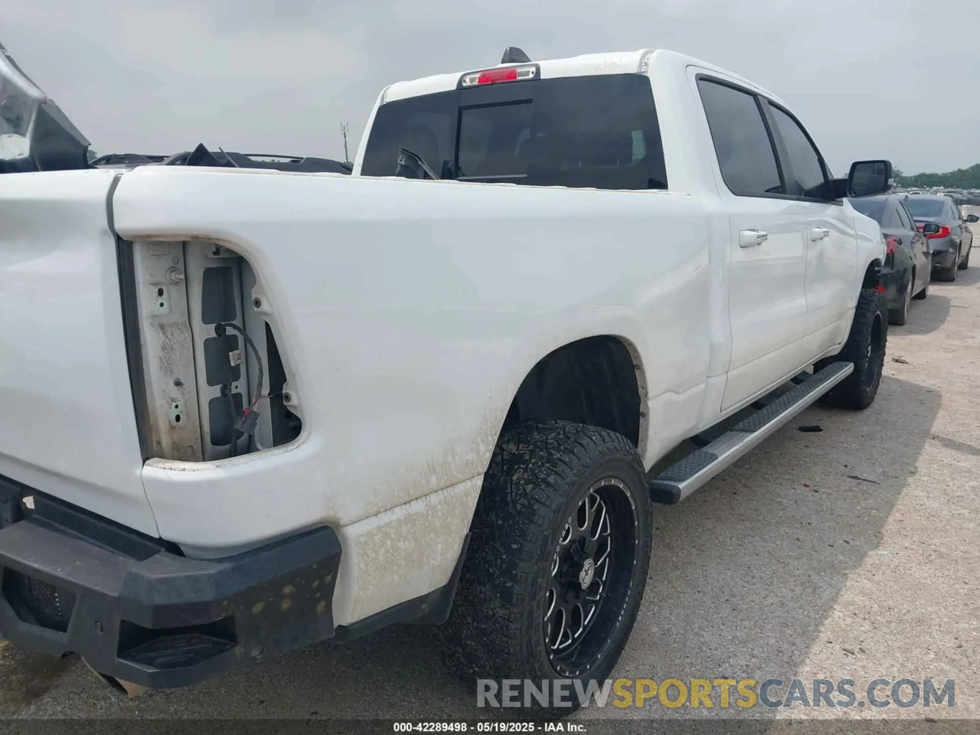 19 Photograph of a damaged car 1C6SRFMT9KN644227 RAM 1500 2019