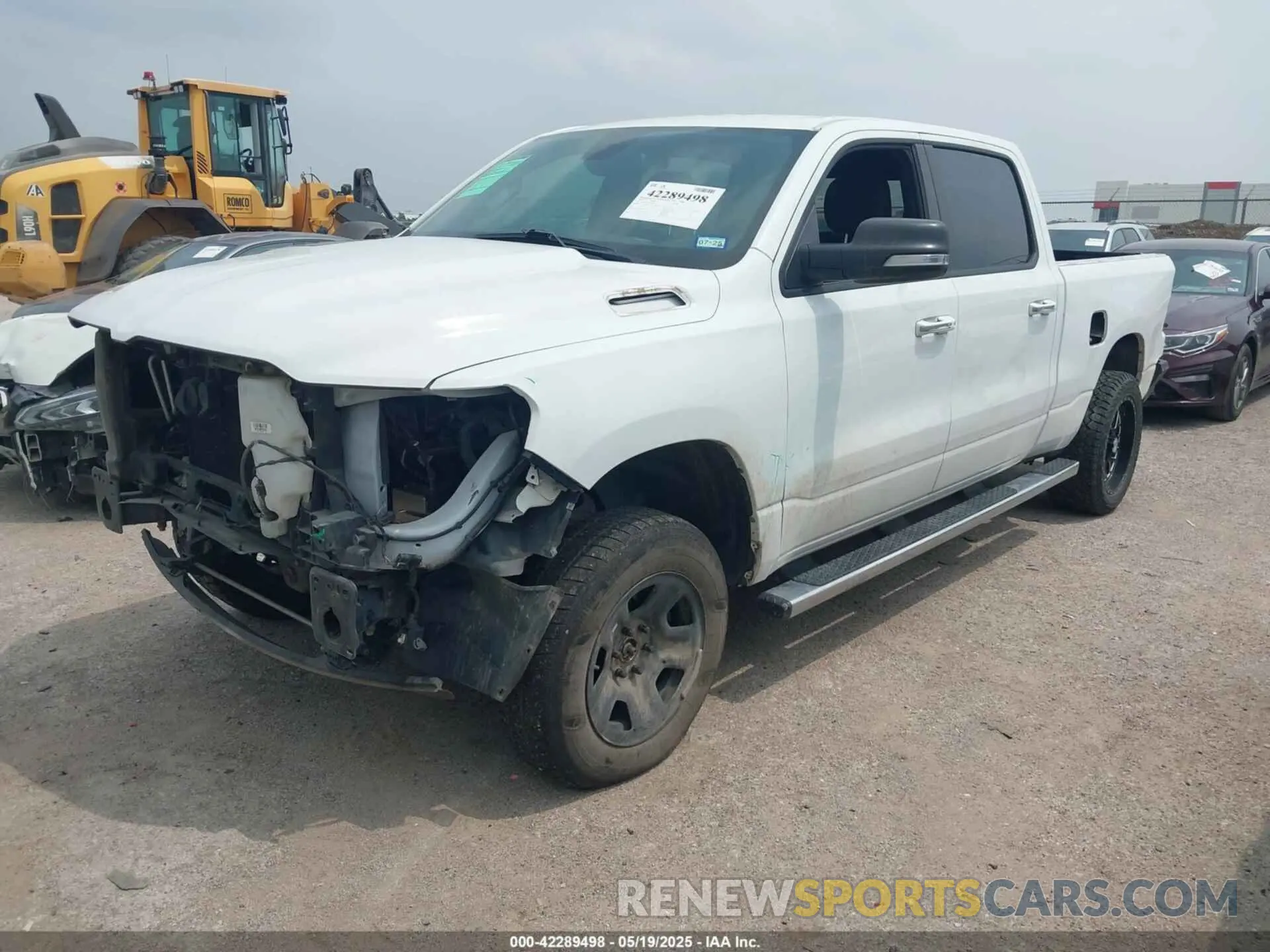 2 Photograph of a damaged car 1C6SRFMT9KN644227 RAM 1500 2019