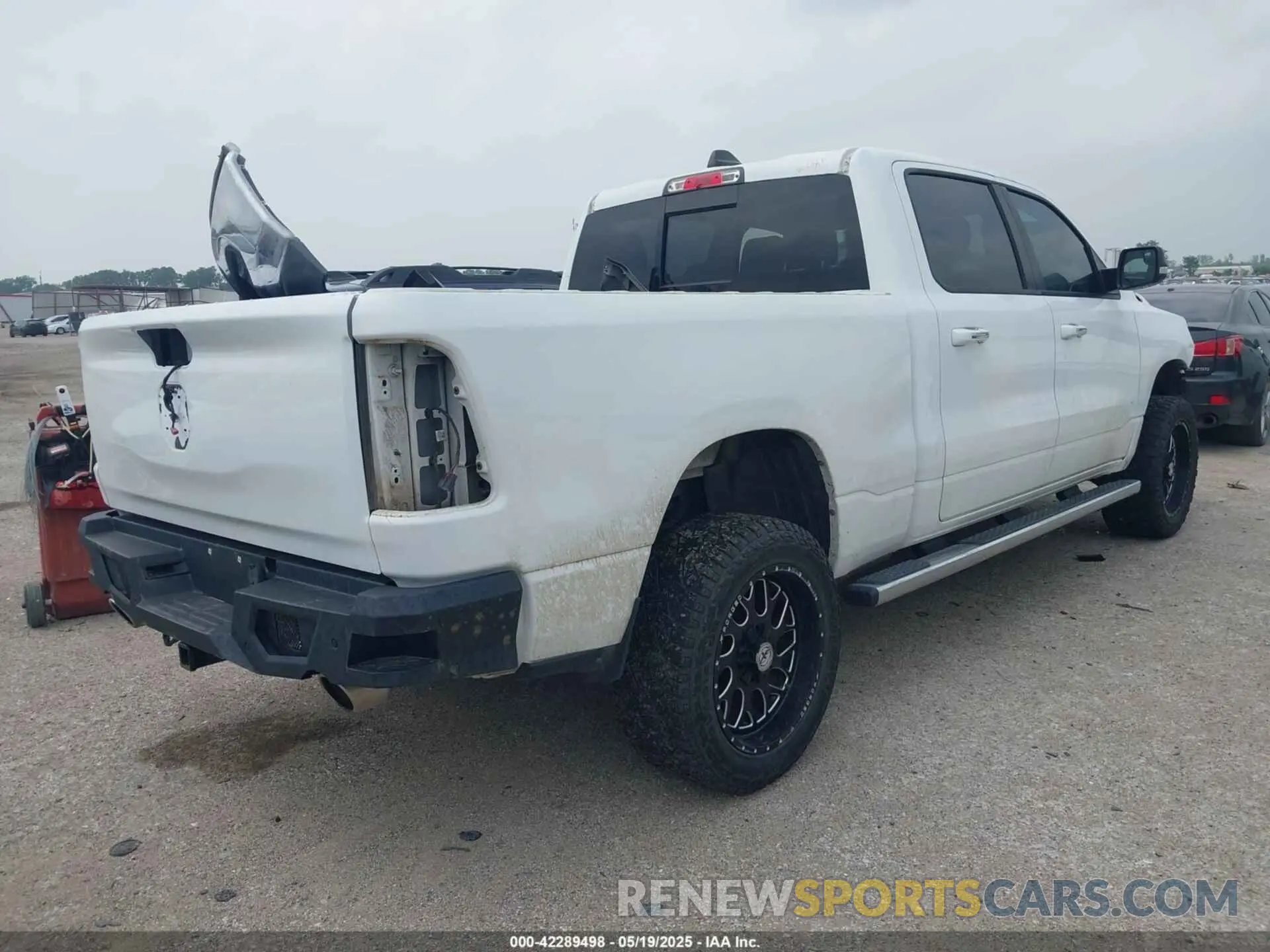 4 Photograph of a damaged car 1C6SRFMT9KN644227 RAM 1500 2019