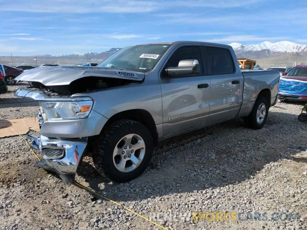 1 Photograph of a damaged car 1C6SRFNT0KN597653 RAM 1500 2019