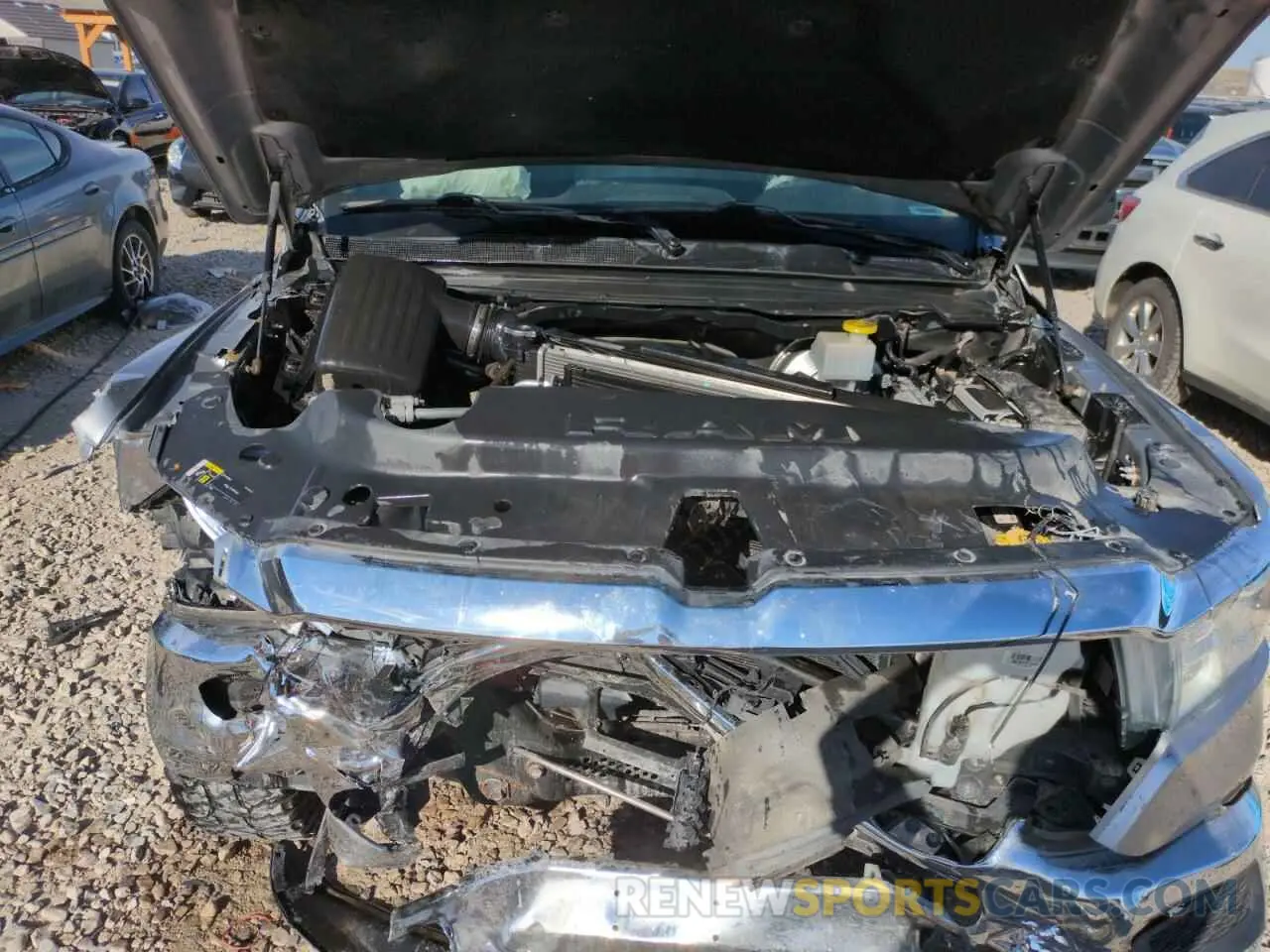 11 Photograph of a damaged car 1C6SRFNT0KN597653 RAM 1500 2019