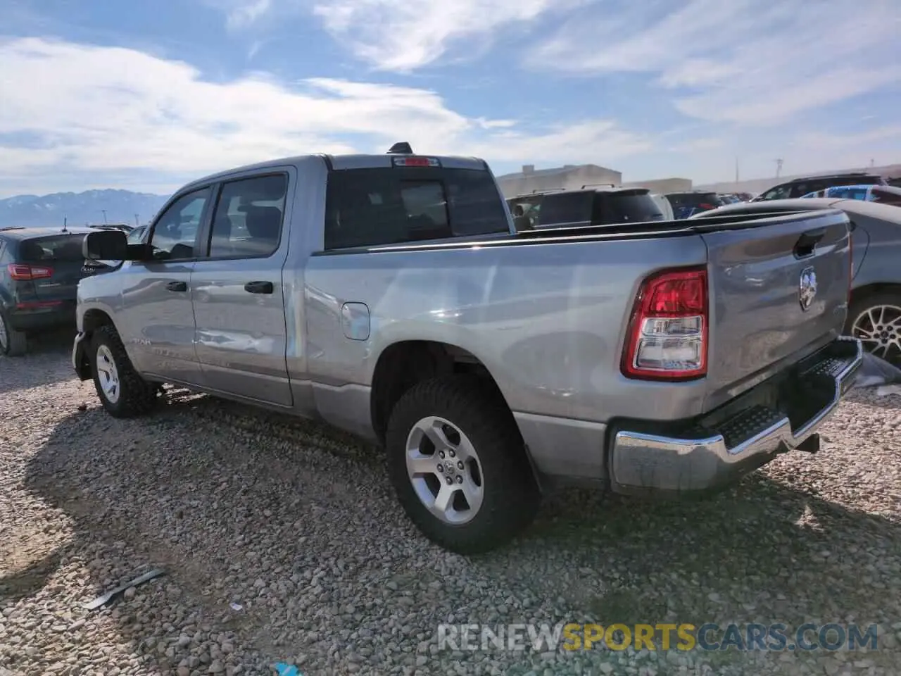 2 Photograph of a damaged car 1C6SRFNT0KN597653 RAM 1500 2019