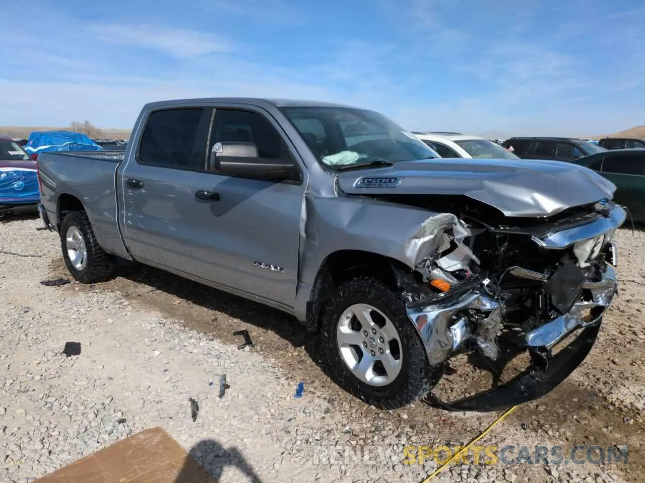 4 Photograph of a damaged car 1C6SRFNT0KN597653 RAM 1500 2019