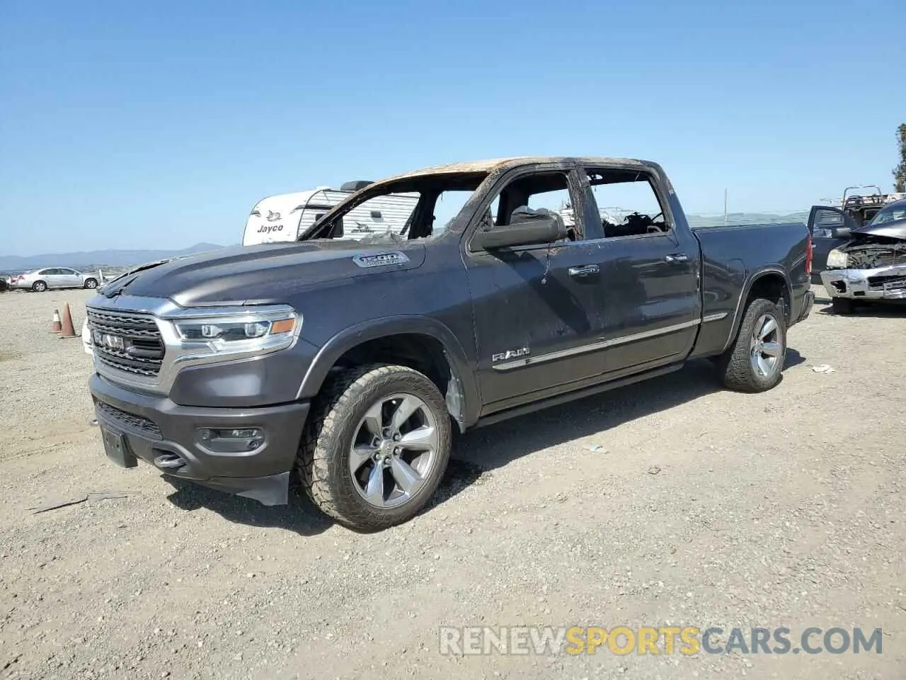1 Photograph of a damaged car 1C6SRFPT2KN829974 RAM 1500 2019