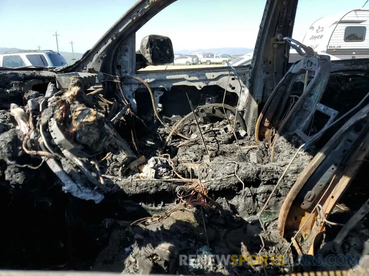 7 Photograph of a damaged car 1C6SRFPT2KN829974 RAM 1500 2019