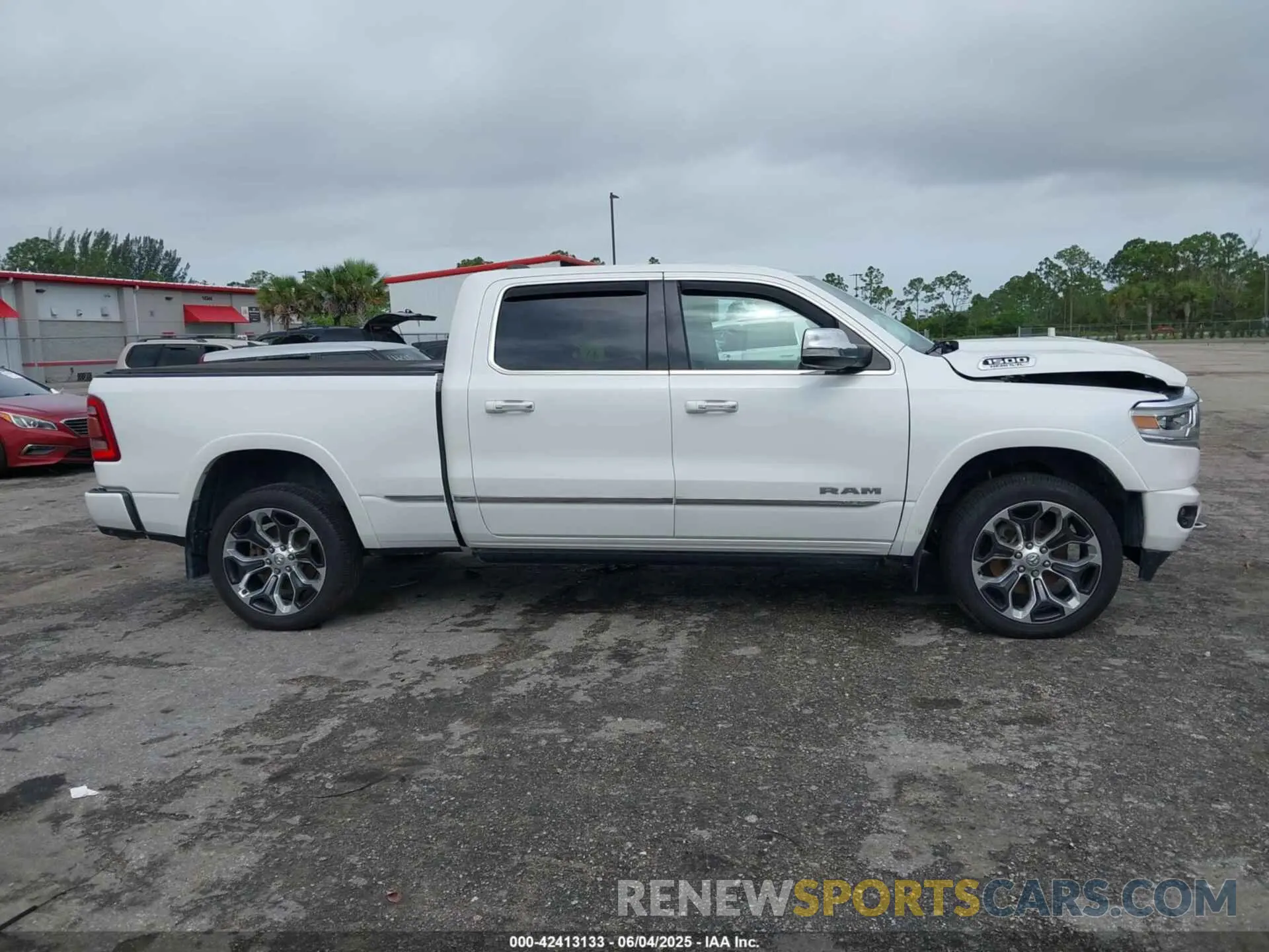 13 Photograph of a damaged car 1C6SRFPT3KN774290 RAM 1500 2019