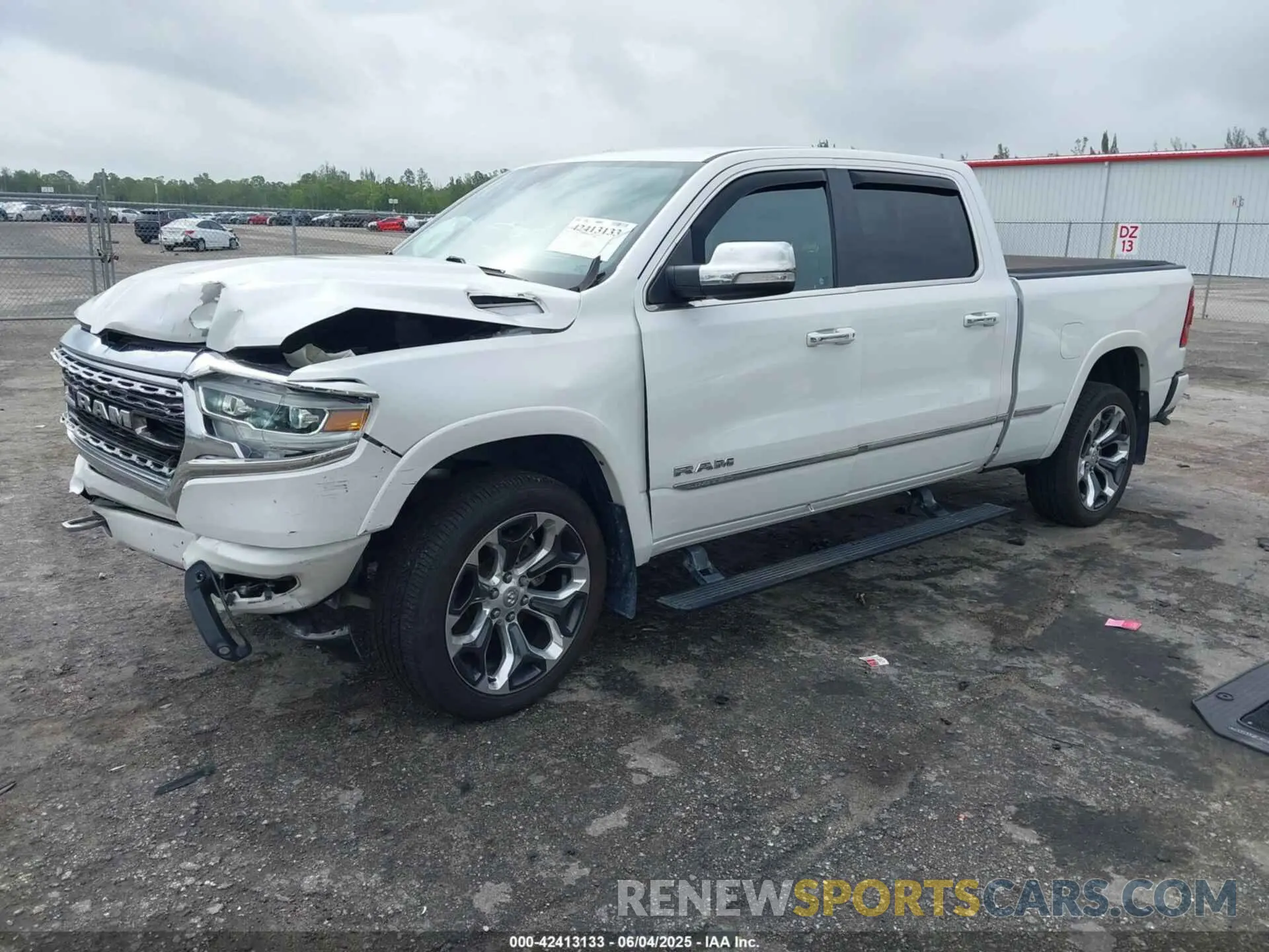 2 Photograph of a damaged car 1C6SRFPT3KN774290 RAM 1500 2019