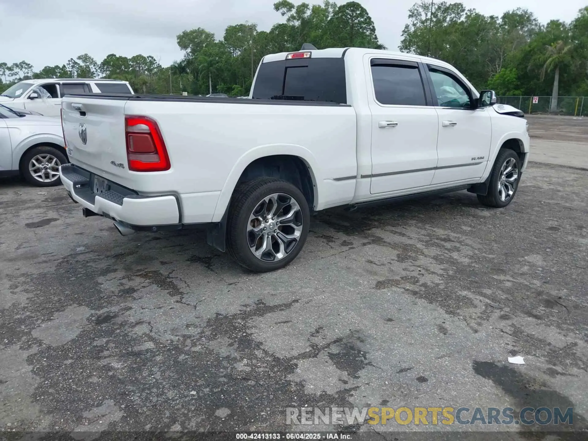 4 Photograph of a damaged car 1C6SRFPT3KN774290 RAM 1500 2019
