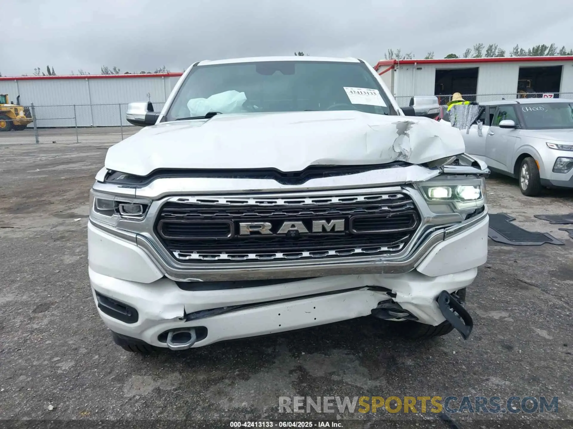 6 Photograph of a damaged car 1C6SRFPT3KN774290 RAM 1500 2019