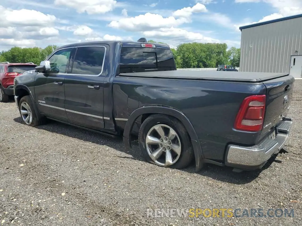 2 Photograph of a damaged car 1C6SRFPT4KN552616 RAM 1500 2019