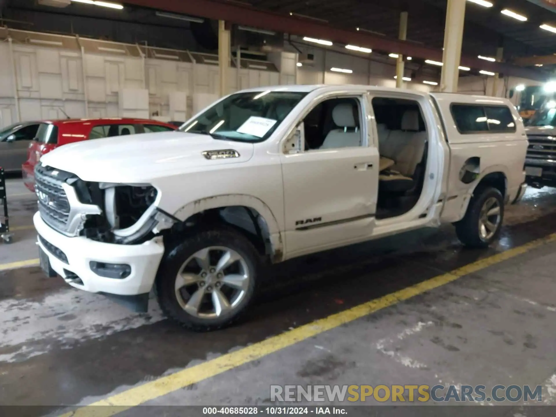 2 Photograph of a damaged car 1C6SRFPTXKN751914 RAM 1500 2019