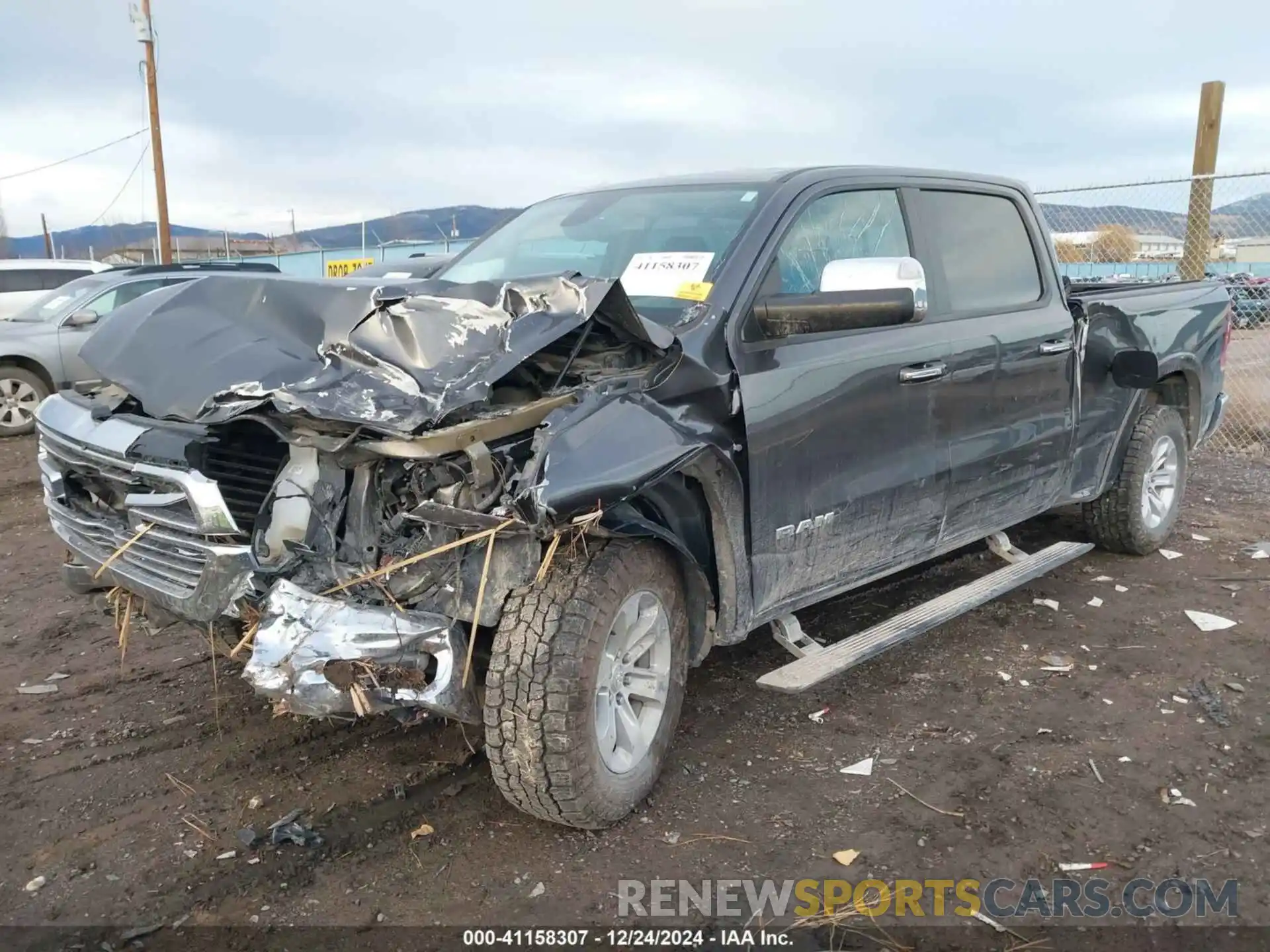 2 Photograph of a damaged car 1C6SRFRT2KN610672 RAM 1500 2019