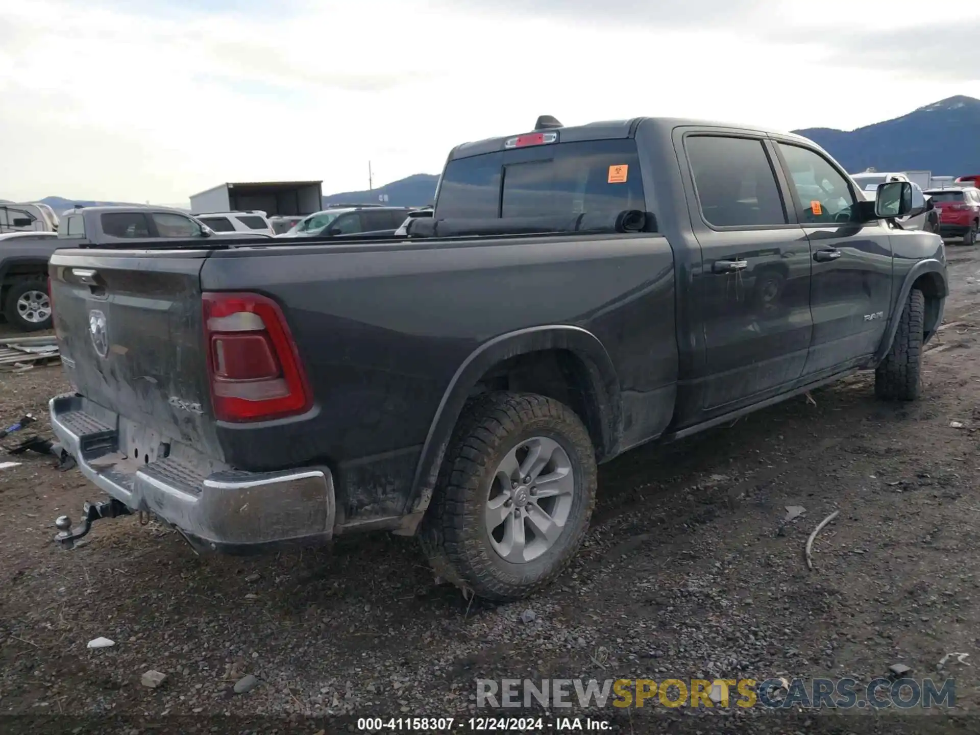 4 Photograph of a damaged car 1C6SRFRT2KN610672 RAM 1500 2019