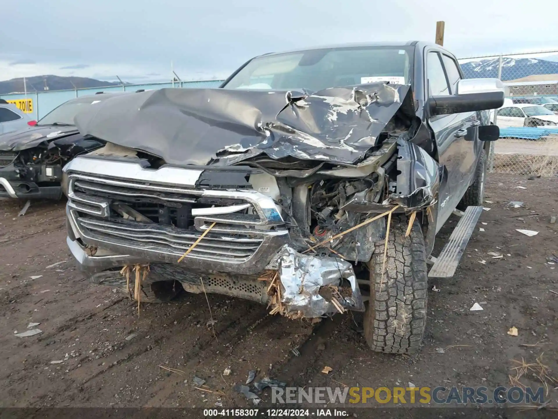 6 Photograph of a damaged car 1C6SRFRT2KN610672 RAM 1500 2019