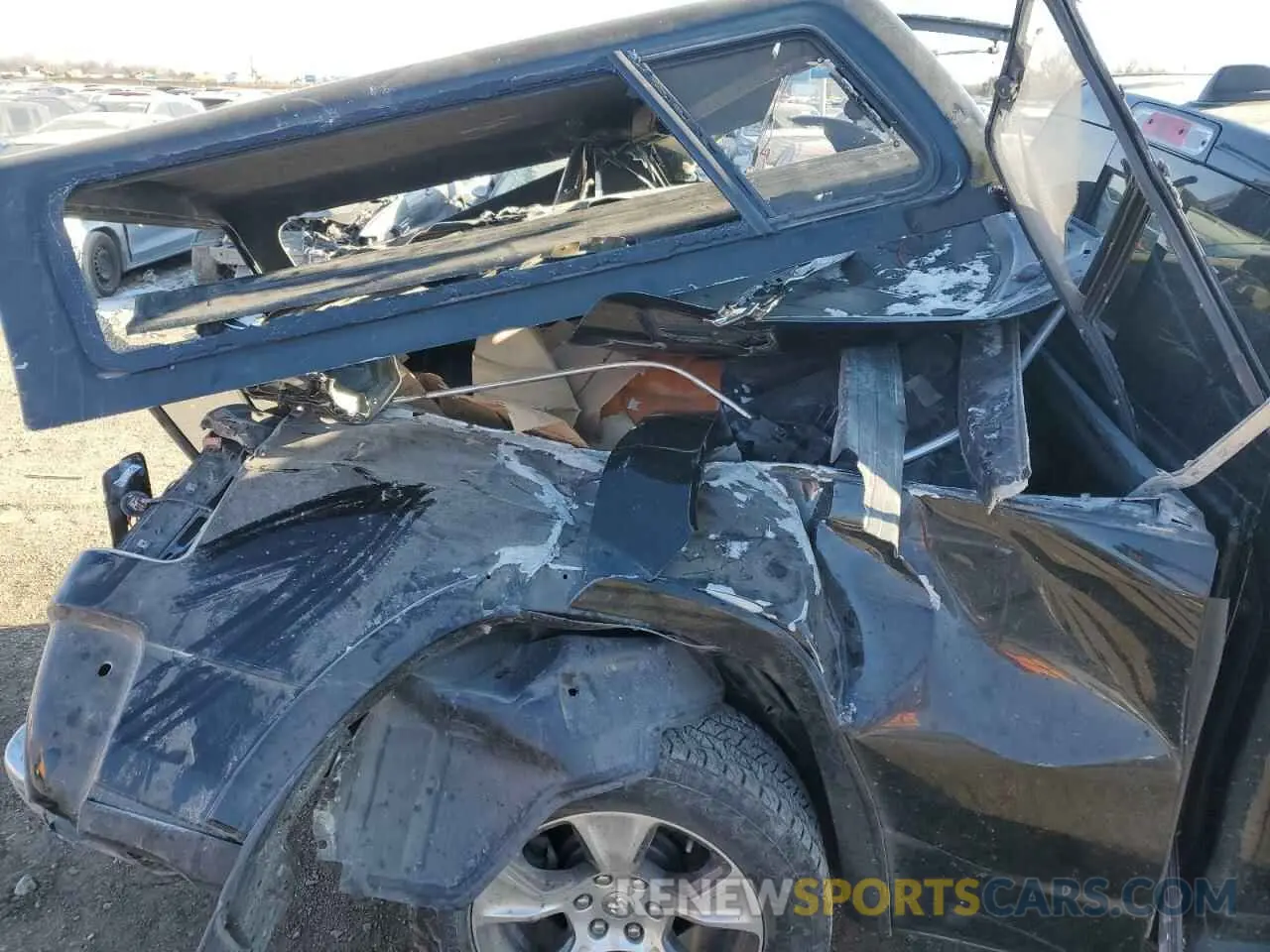 14 Photograph of a damaged car 1C6SRFRT2KN665459 RAM 1500 2019