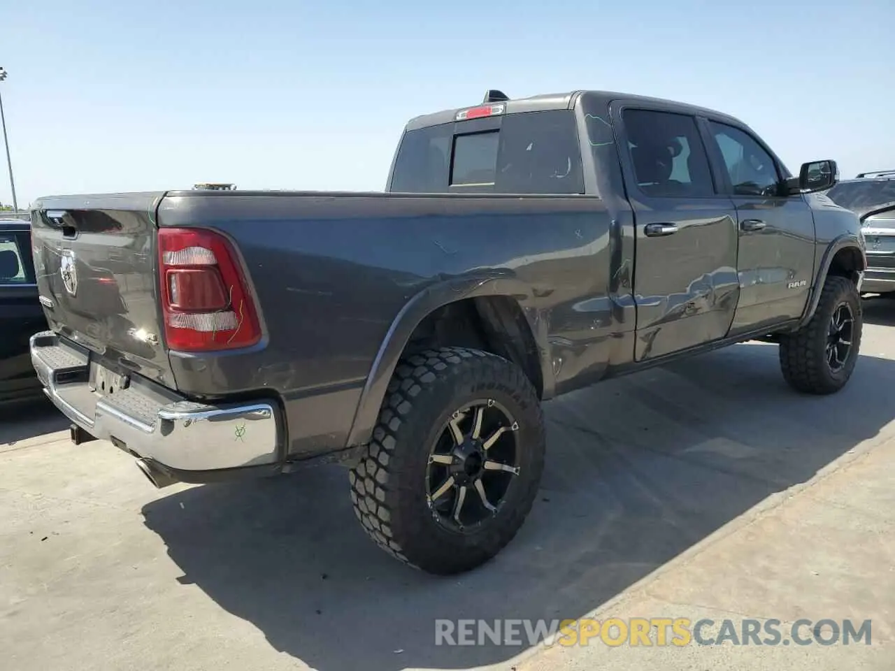 3 Photograph of a damaged car 1C6SRFRT2KN698574 RAM 1500 2019
