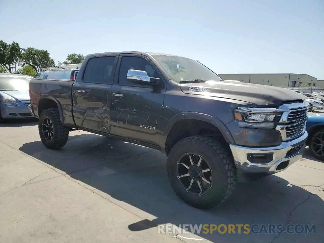 4 Photograph of a damaged car 1C6SRFRT2KN698574 RAM 1500 2019