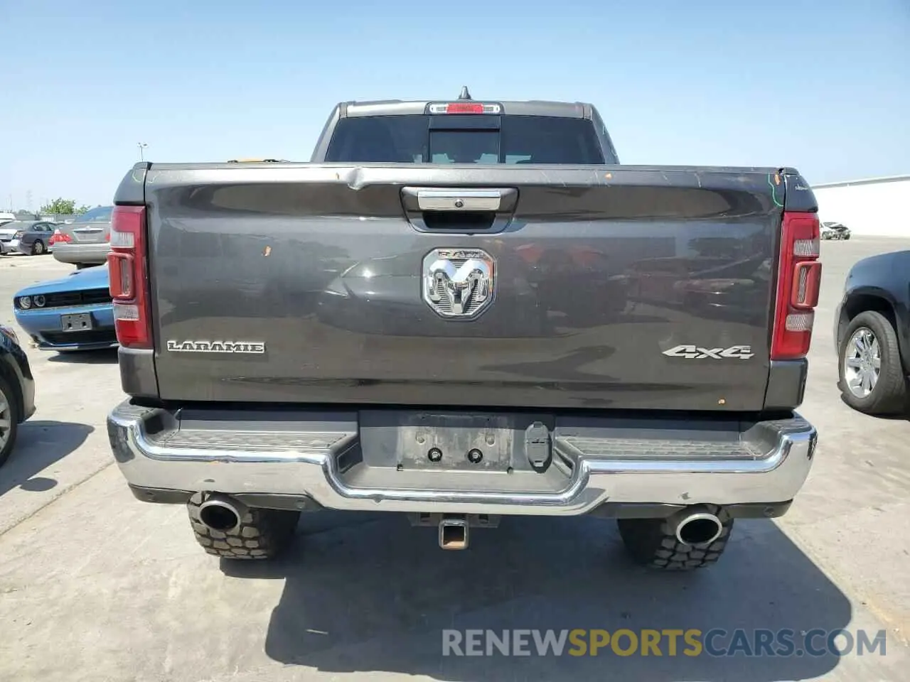 6 Photograph of a damaged car 1C6SRFRT2KN698574 RAM 1500 2019