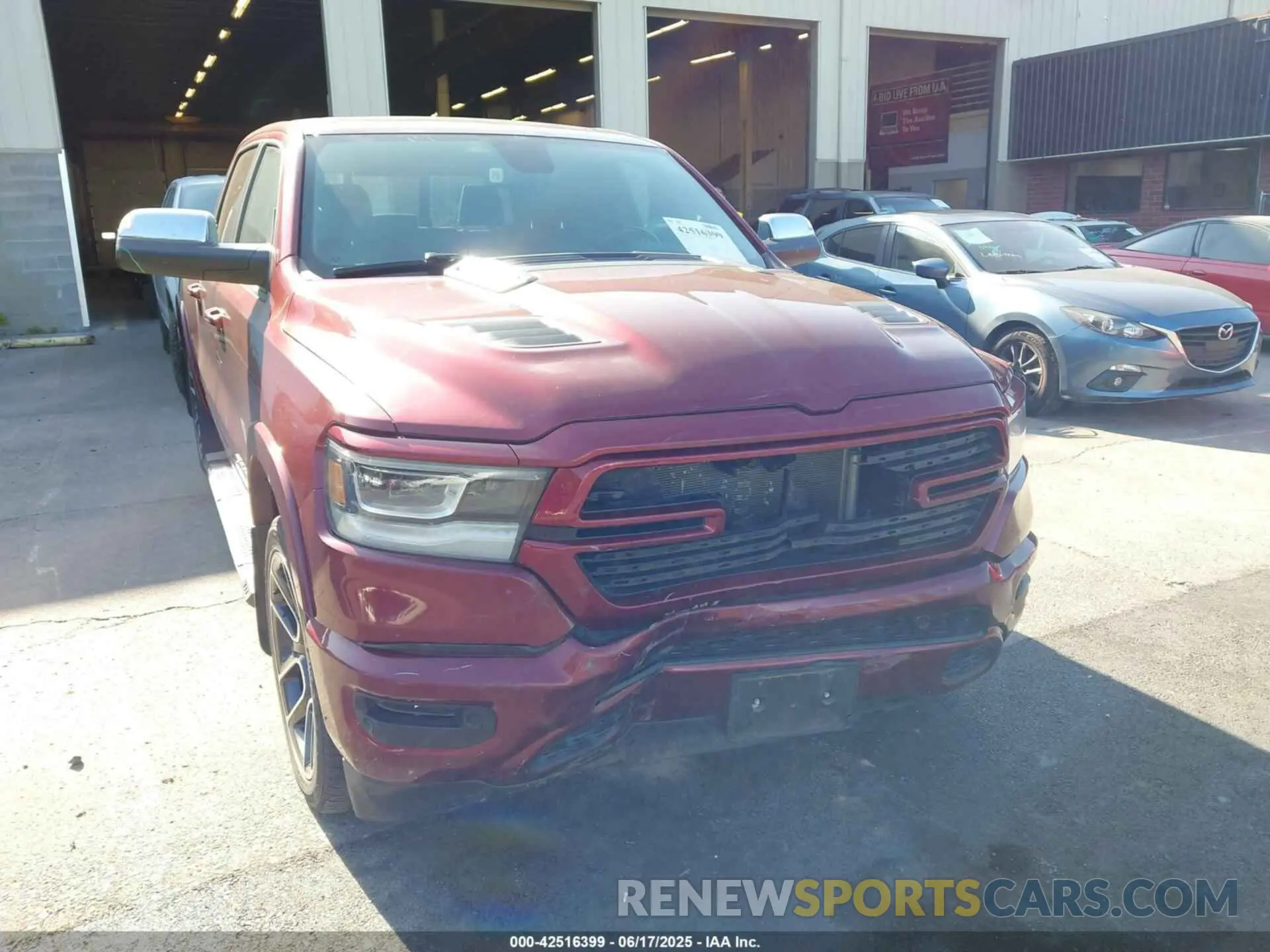 6 Photograph of a damaged car 1C6SRFRT4KN707534 RAM 1500 2019