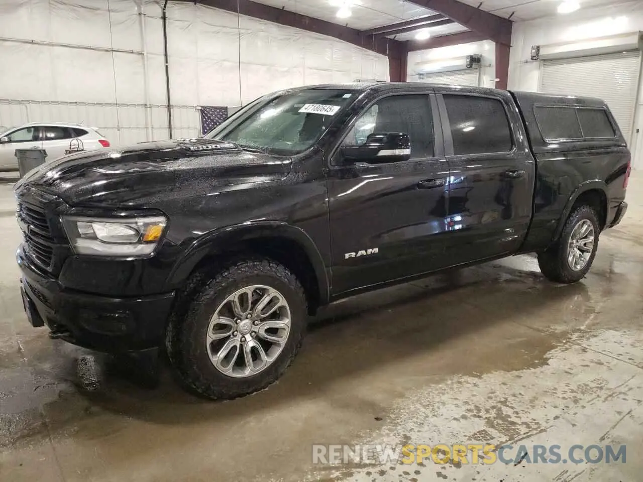1 Photograph of a damaged car 1C6SRFRT4KN871625 RAM 1500 2019