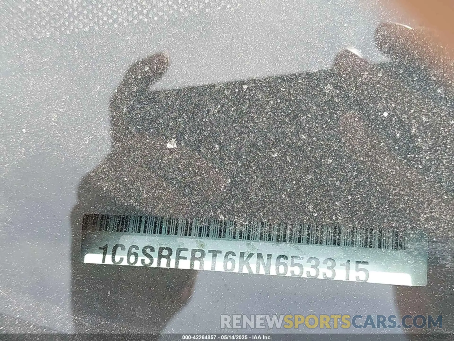 9 Photograph of a damaged car 1C6SRFRT6KN653315 RAM 1500 2019