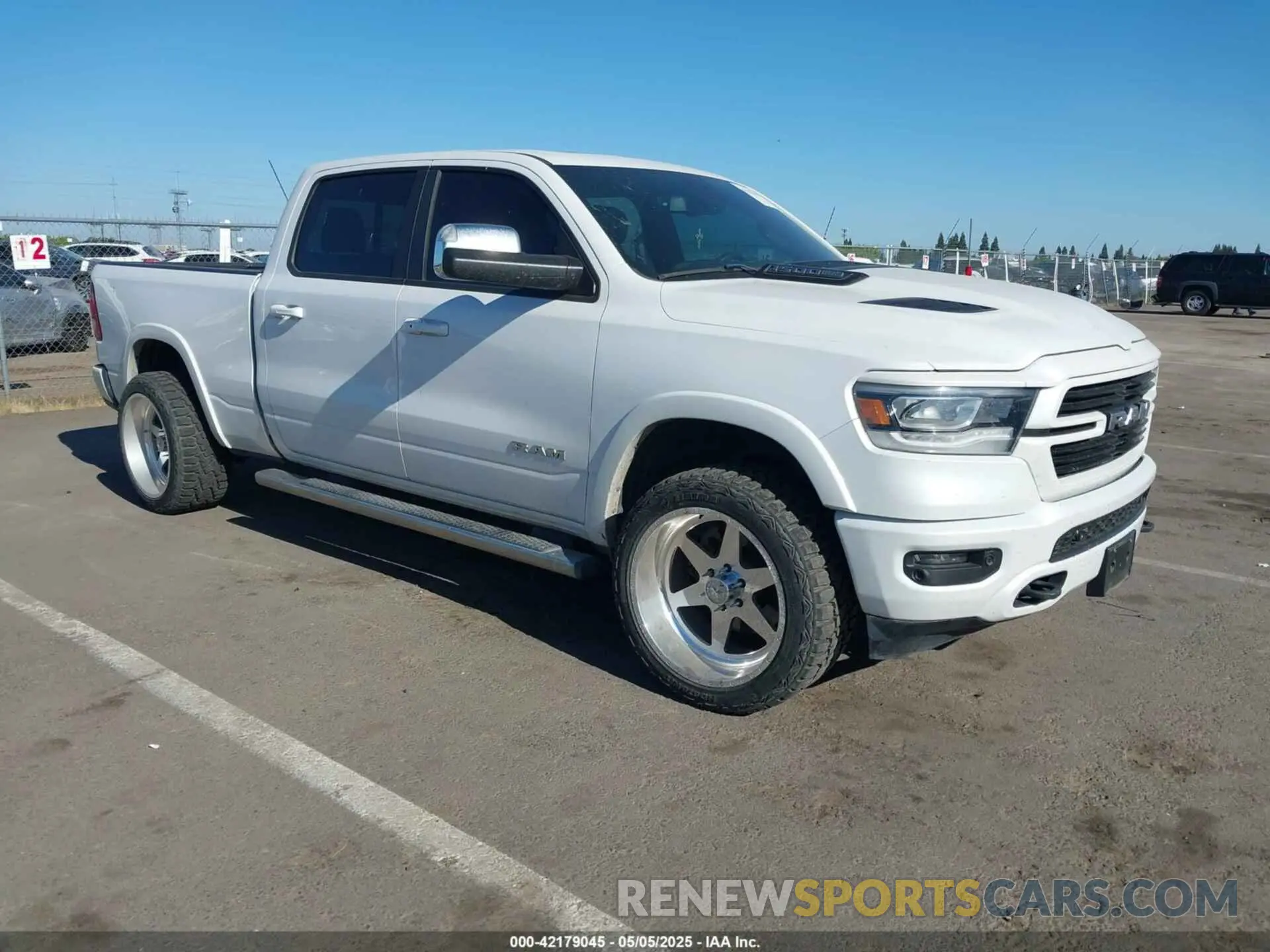 1 Photograph of a damaged car 1C6SRFRT8KN687191 RAM 1500 2019