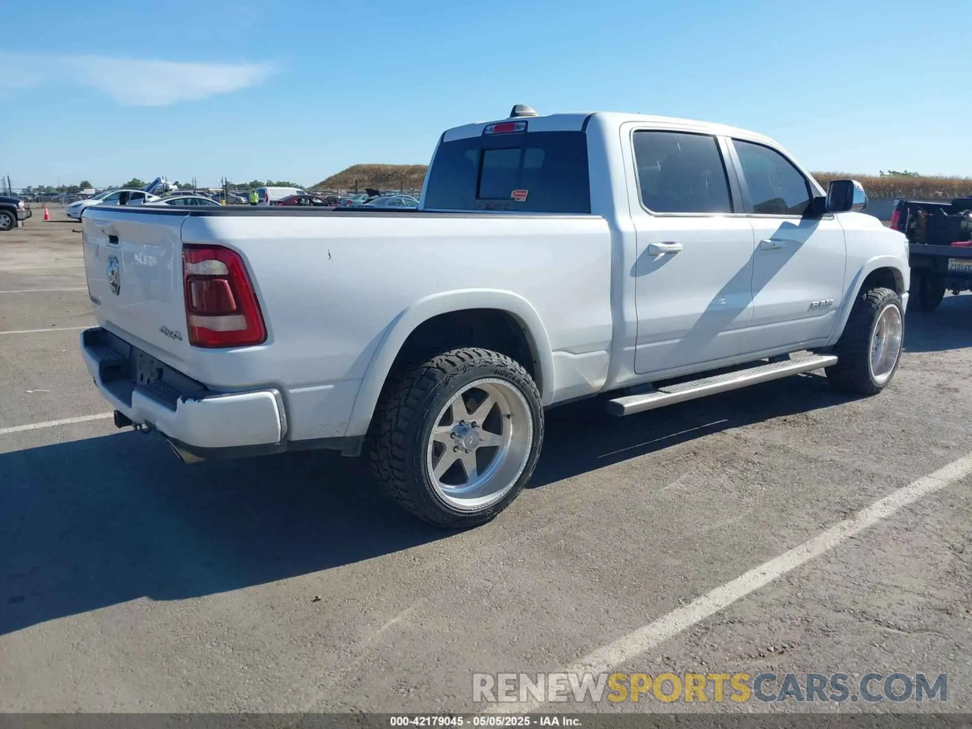 4 Photograph of a damaged car 1C6SRFRT8KN687191 RAM 1500 2019