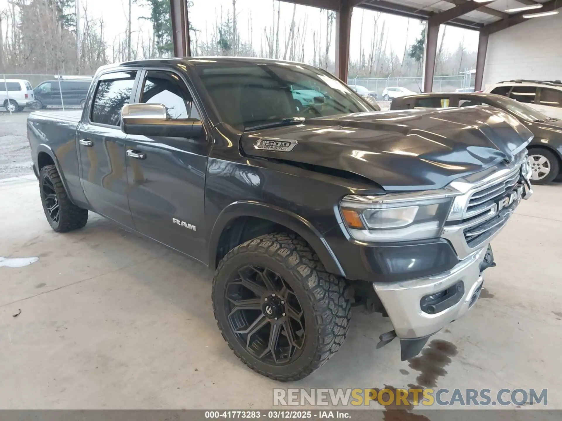 1 Photograph of a damaged car 1C6SRFRT9KN878862 RAM 1500 2019