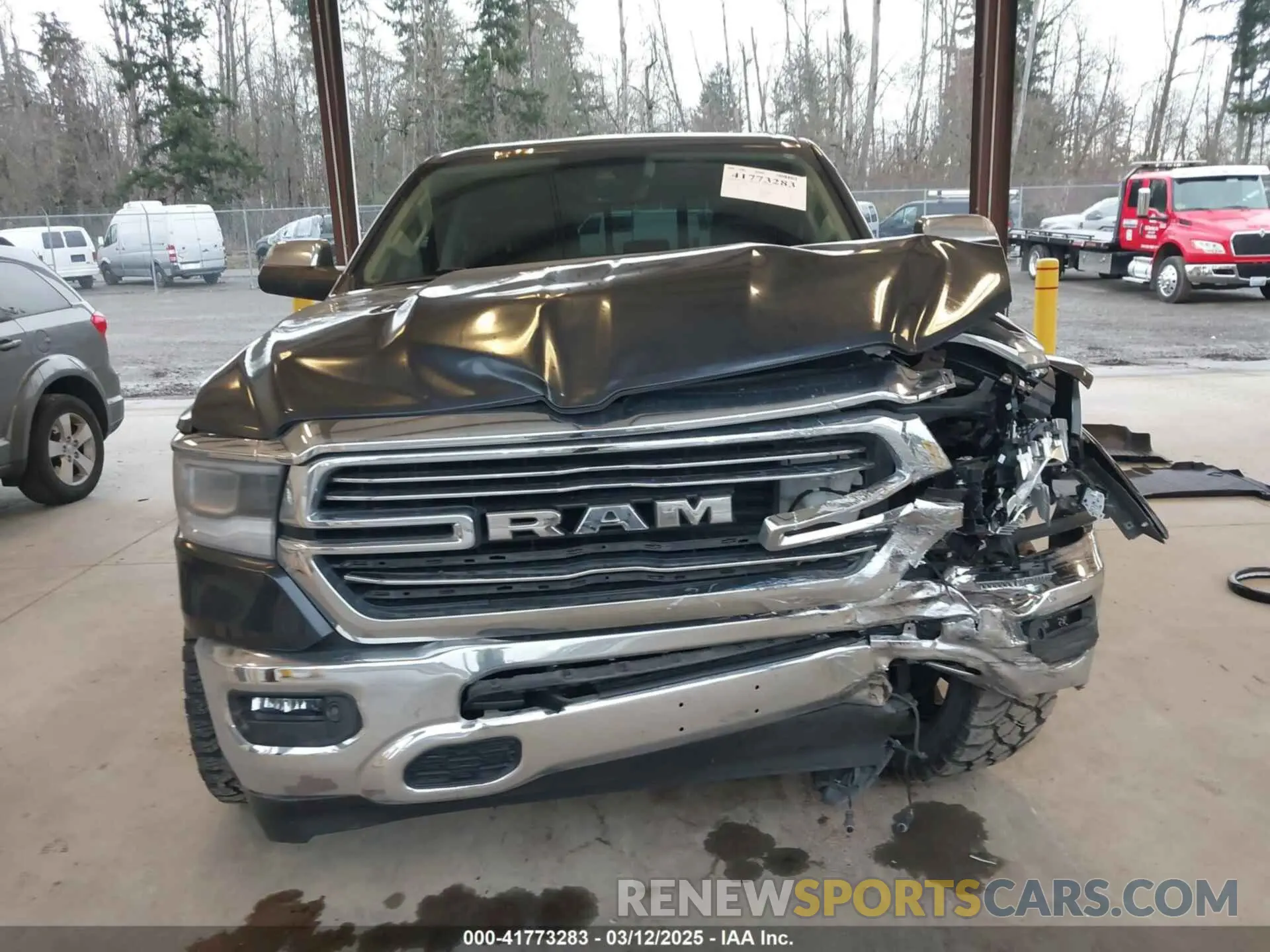 12 Photograph of a damaged car 1C6SRFRT9KN878862 RAM 1500 2019