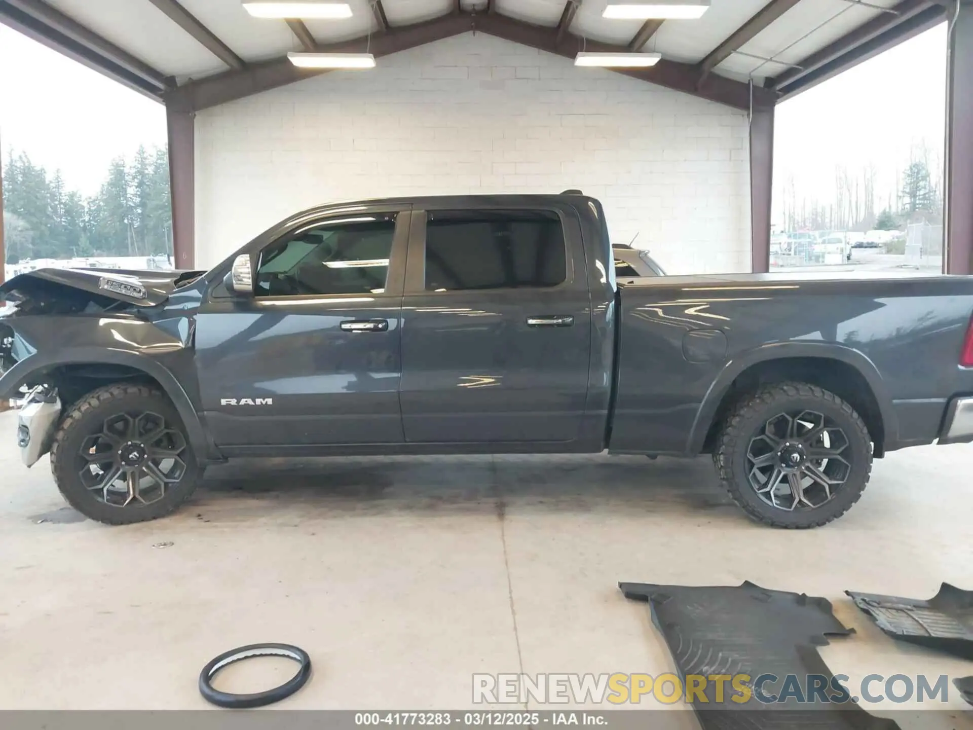 14 Photograph of a damaged car 1C6SRFRT9KN878862 RAM 1500 2019
