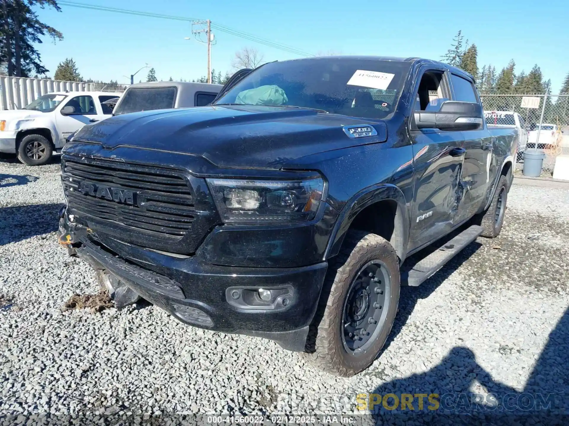 2 Photograph of a damaged car 1C6SRFRTXKN855235 RAM 1500 2019