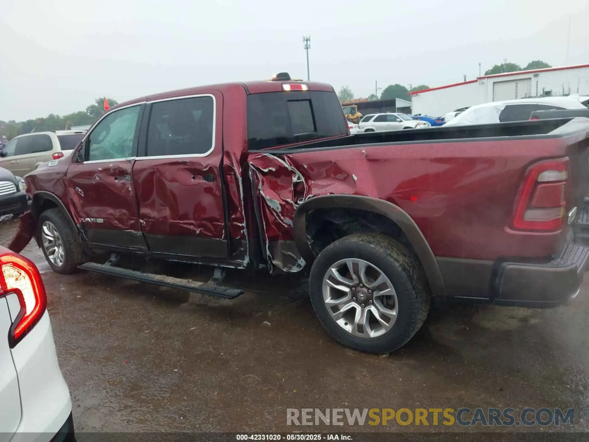 14 Photograph of a damaged car 1C6SRFST4KN563879 RAM 1500 2019
