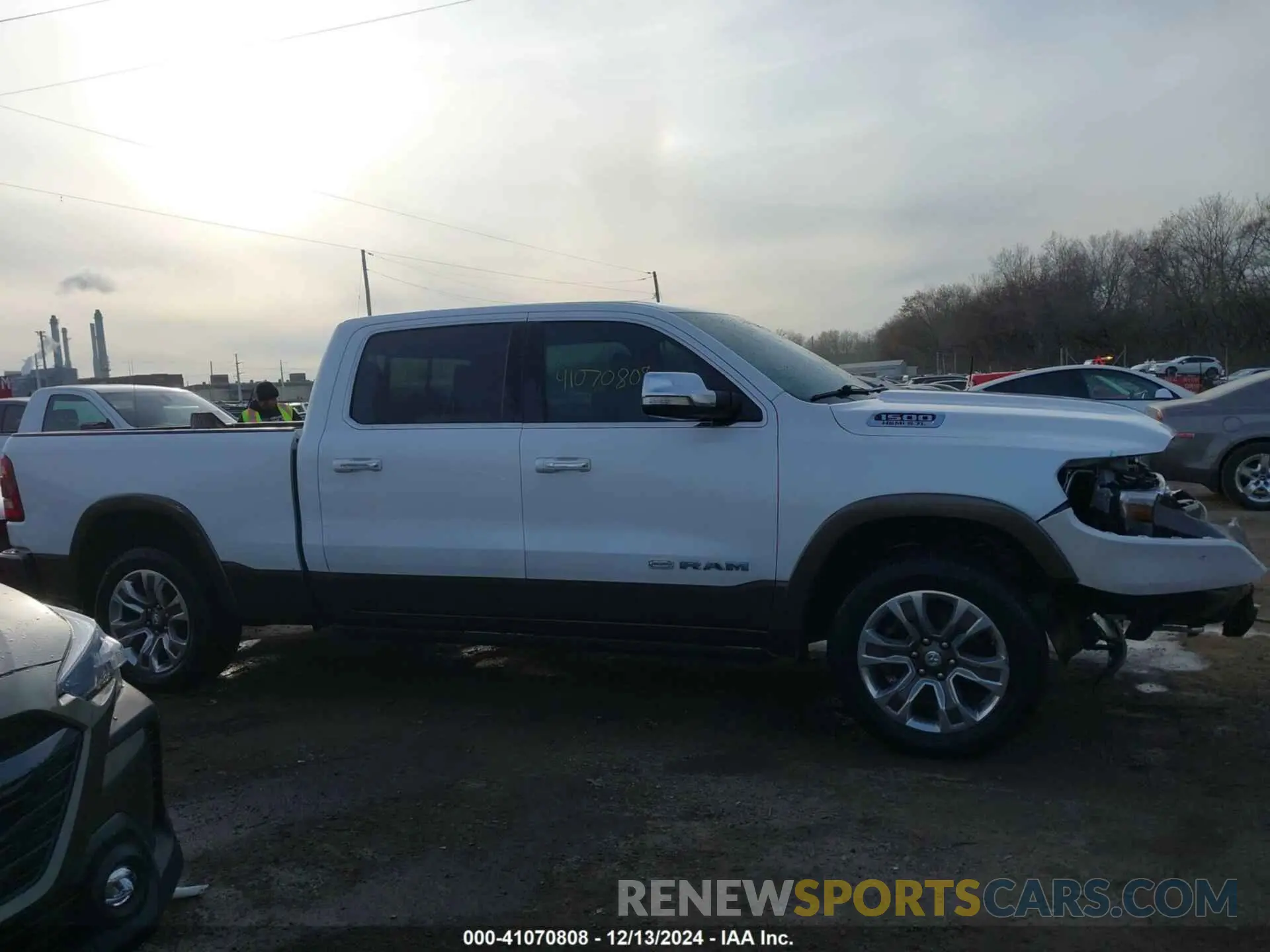 13 Photograph of a damaged car 1C6SRFST6KN886928 RAM 1500 2019