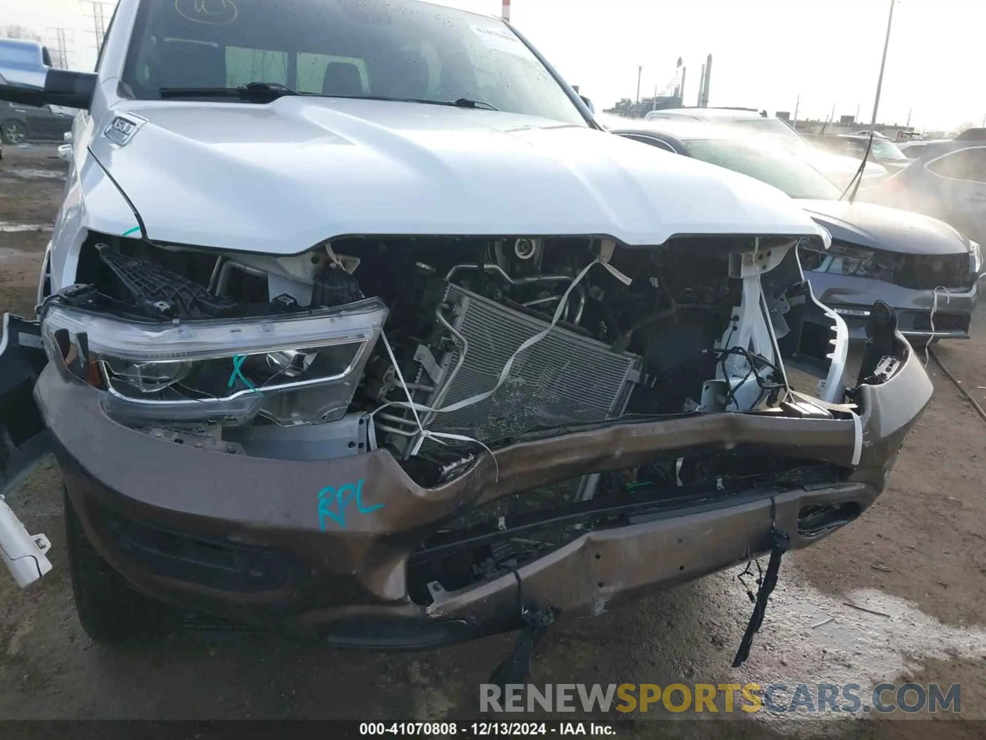 6 Photograph of a damaged car 1C6SRFST6KN886928 RAM 1500 2019