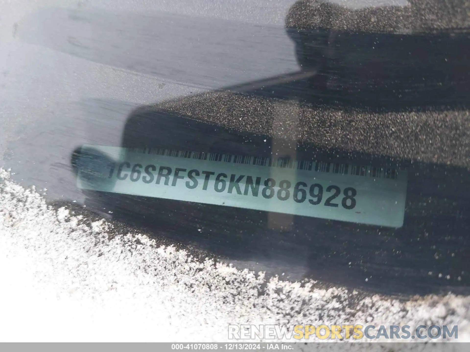 9 Photograph of a damaged car 1C6SRFST6KN886928 RAM 1500 2019