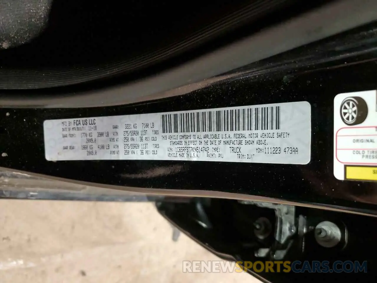 13 Photograph of a damaged car 1C6SRFST7KN514742 RAM 1500 2019