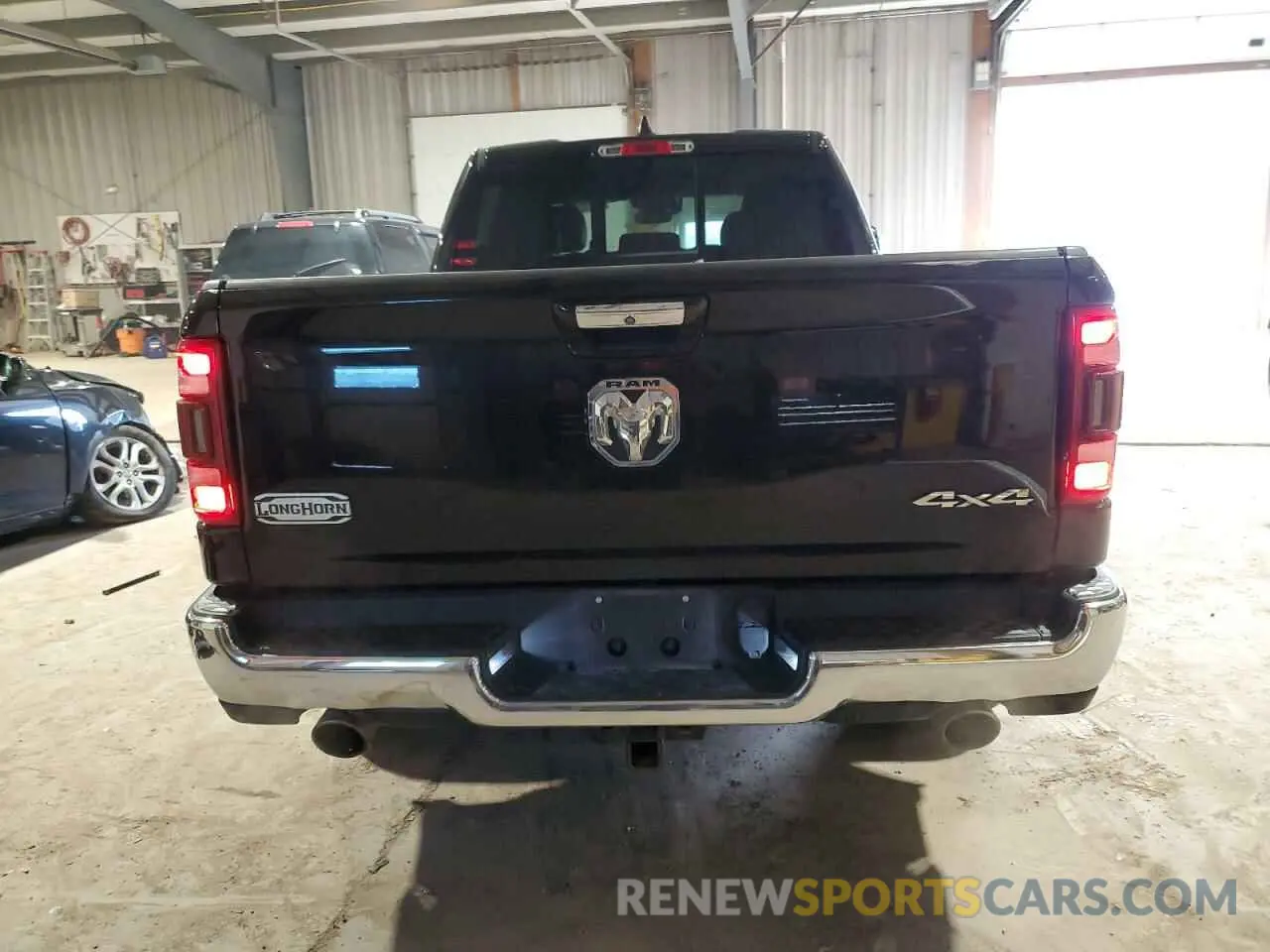 6 Photograph of a damaged car 1C6SRFST7KN514742 RAM 1500 2019