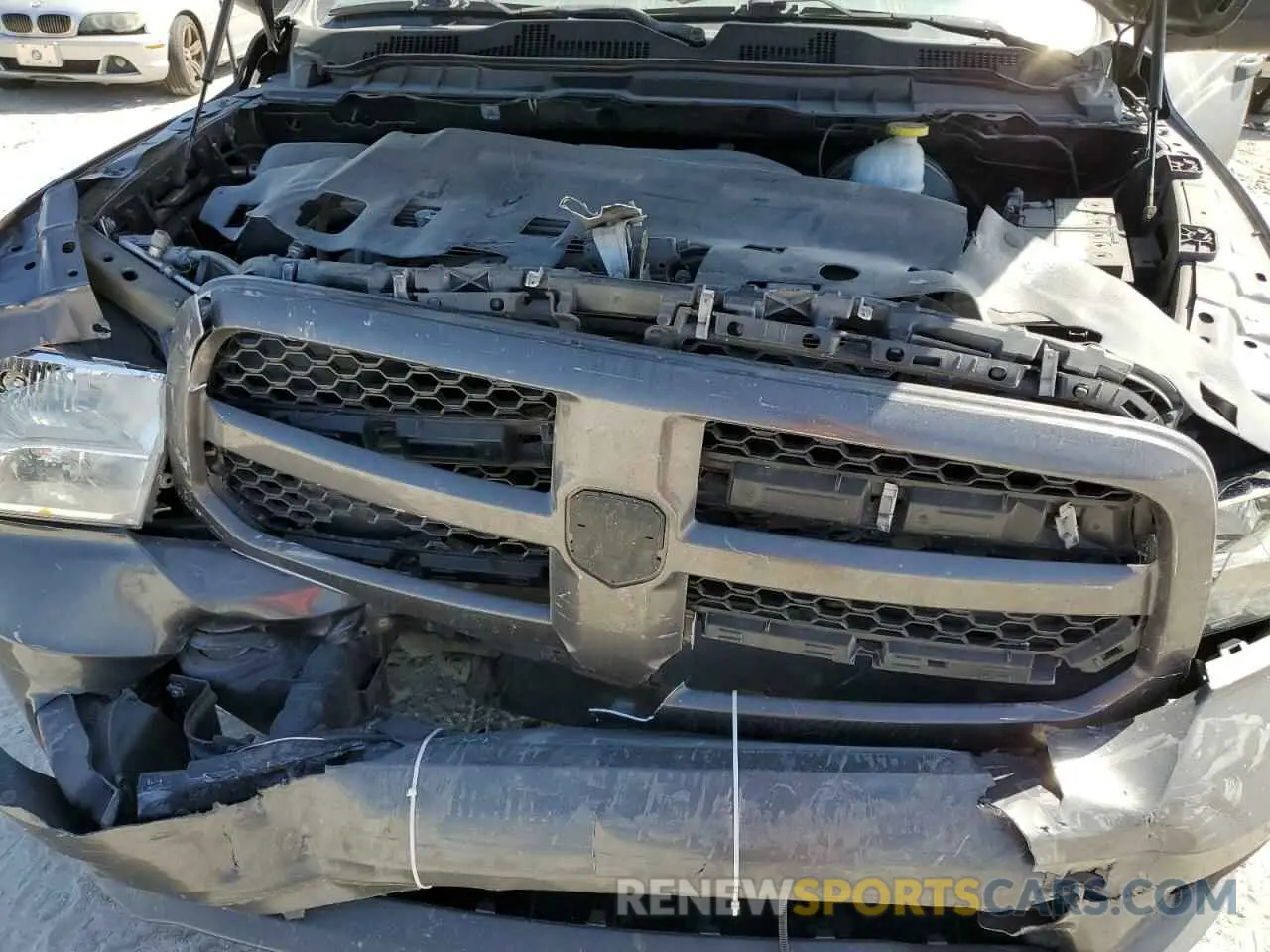 11 Photograph of a damaged car 3C6JR6AG8KG500941 RAM 1500 2019