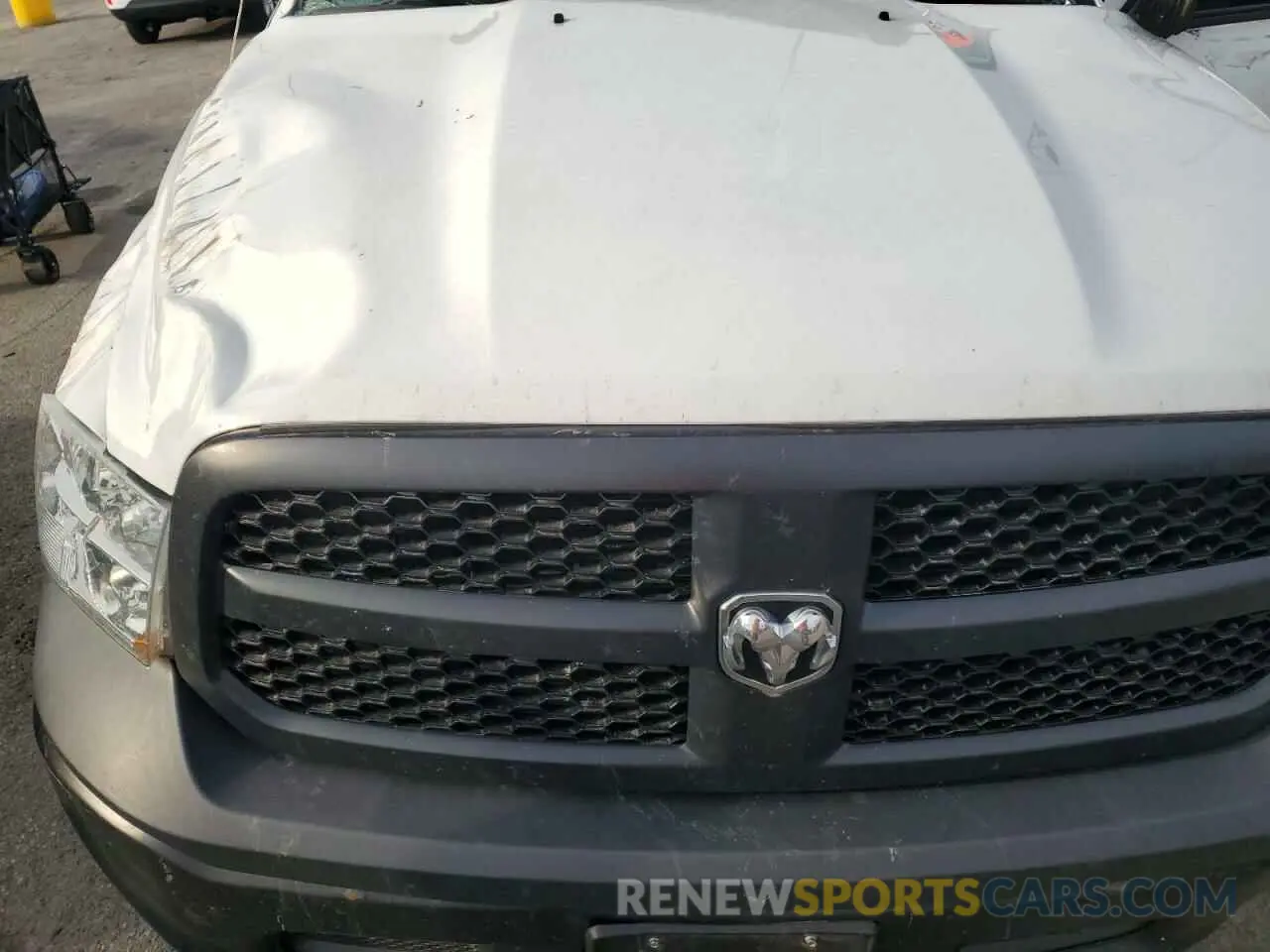 11 Photograph of a damaged car 3C6JR6DG5KG651666 RAM 1500 2019