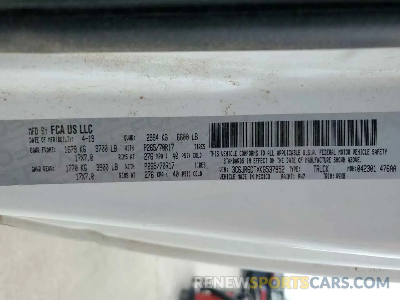 12 Photograph of a damaged car 3C6JR6DTXKG537952 RAM 1500 2019