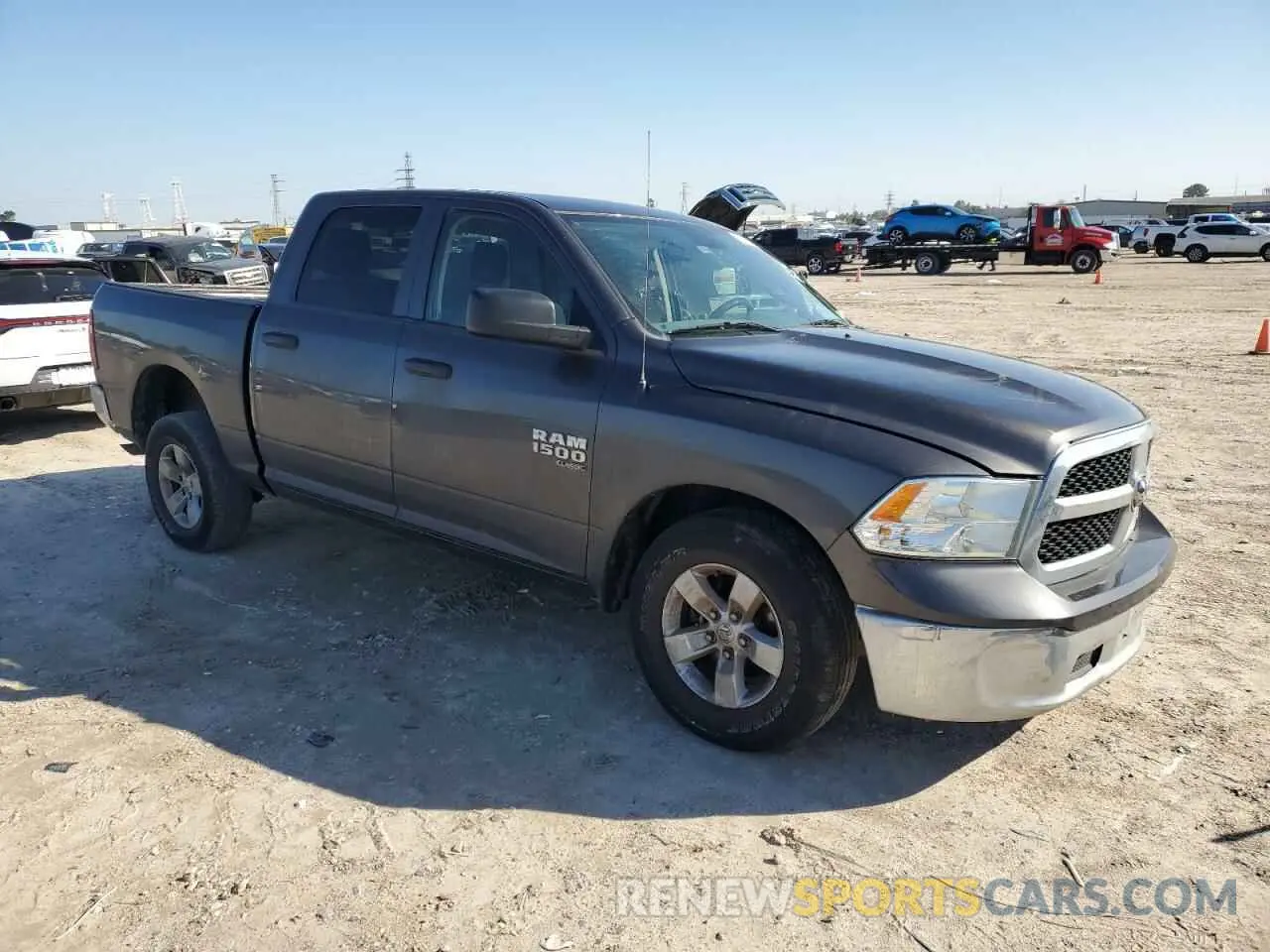 4 Photograph of a damaged car 3C6RR6KG3KG690083 RAM 1500 2019