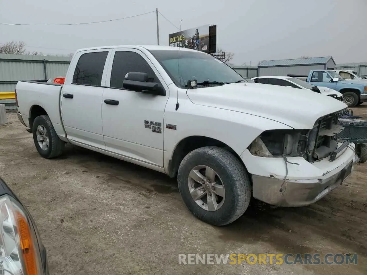 4 Photograph of a damaged car 3C6RR7KTXKG686924 RAM 1500 2019