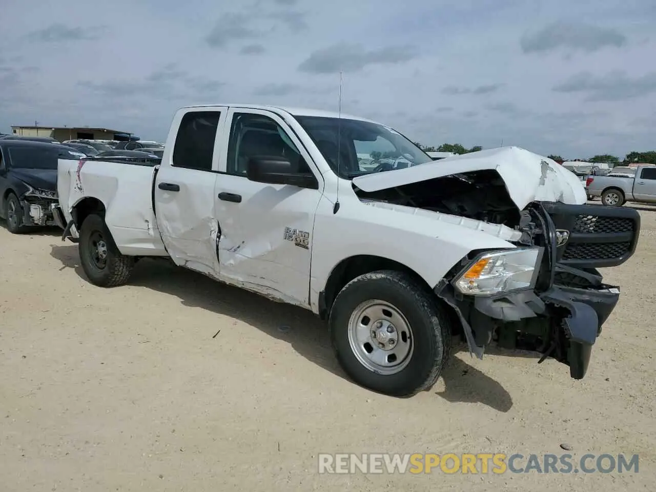 4 Photograph of a damaged car 1C6RR6FG5LS128402 RAM 1500 2020