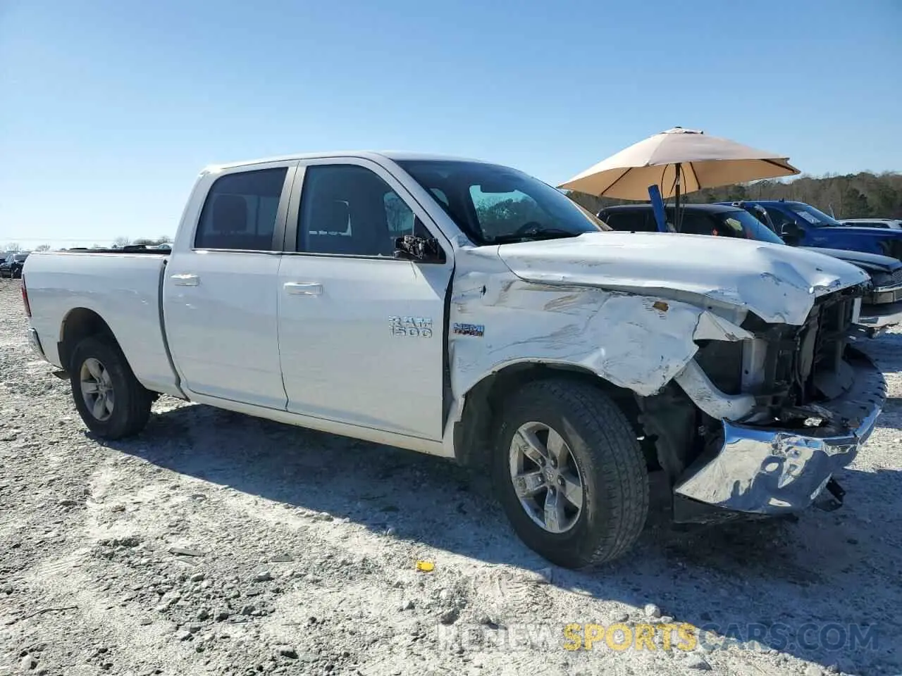 4 Photograph of a damaged car 1C6RR6TT0LS111072 RAM 1500 2020