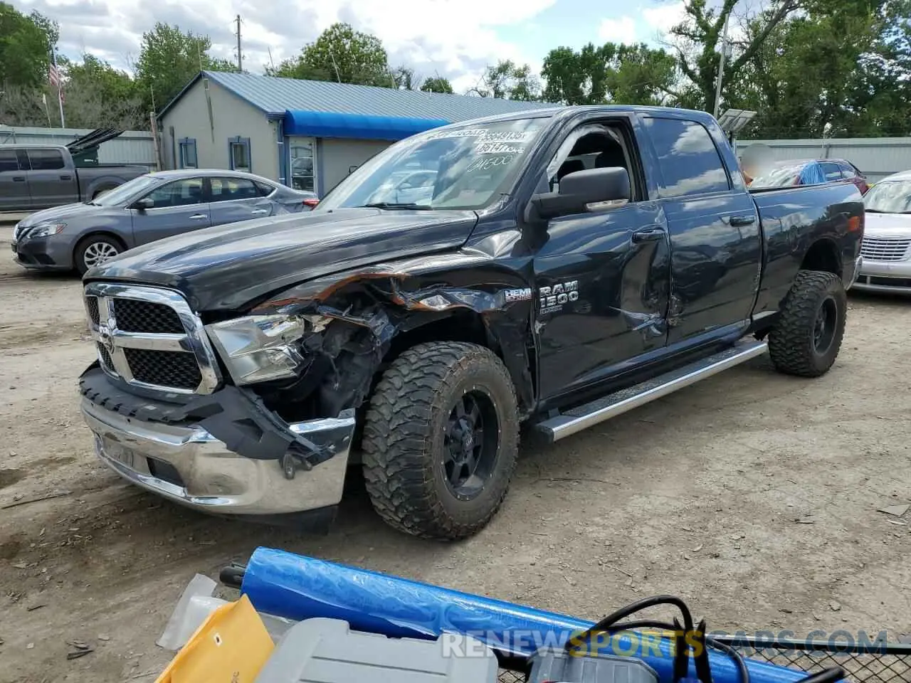 1 Photograph of a damaged car 1C6RR6TT0LS134500 RAM 1500 2020