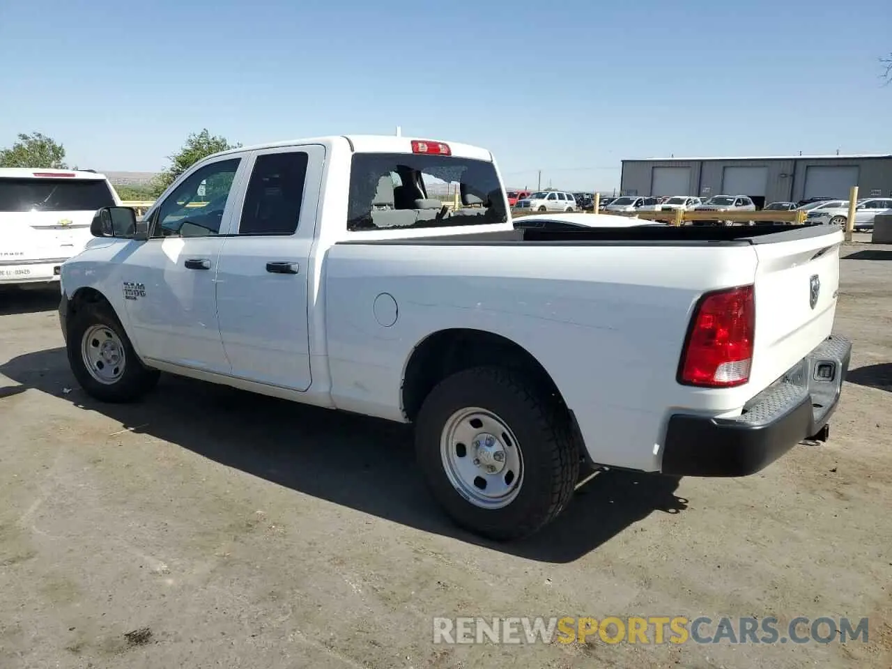 2 Photograph of a damaged car 1C6RR7FG4LS161459 RAM 1500 2020