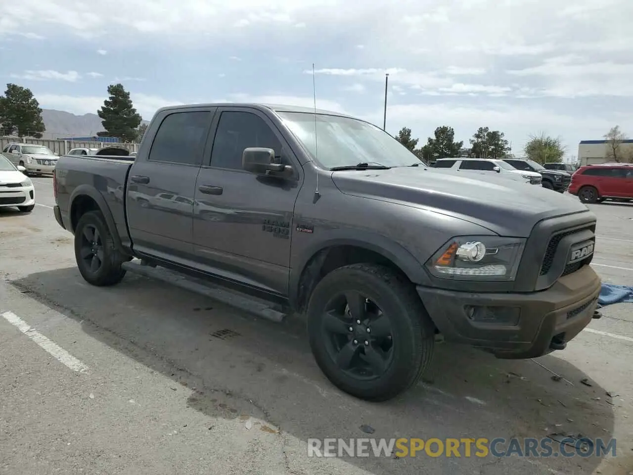 4 Photograph of a damaged car 1C6RR7LT5LS137012 RAM 1500 2020